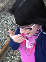 Busty amateur sucks off her man outside by the river as he films